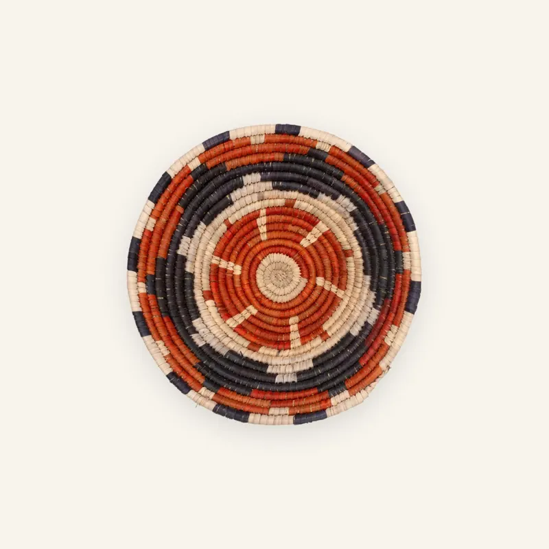 Small handwoven wall plate, 23 cm, in orange, black, beige